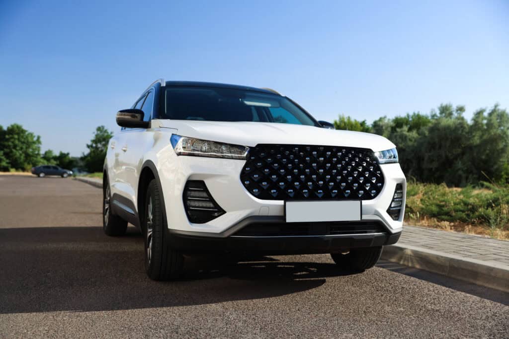 sleek white modern suv parked on a sunny road 2026 08 10 20 23 52 utc