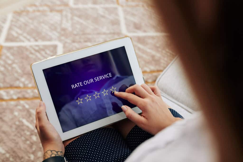 customer using digital tablet for five star feedba 2026 09 23 12 02 19 utc (1)