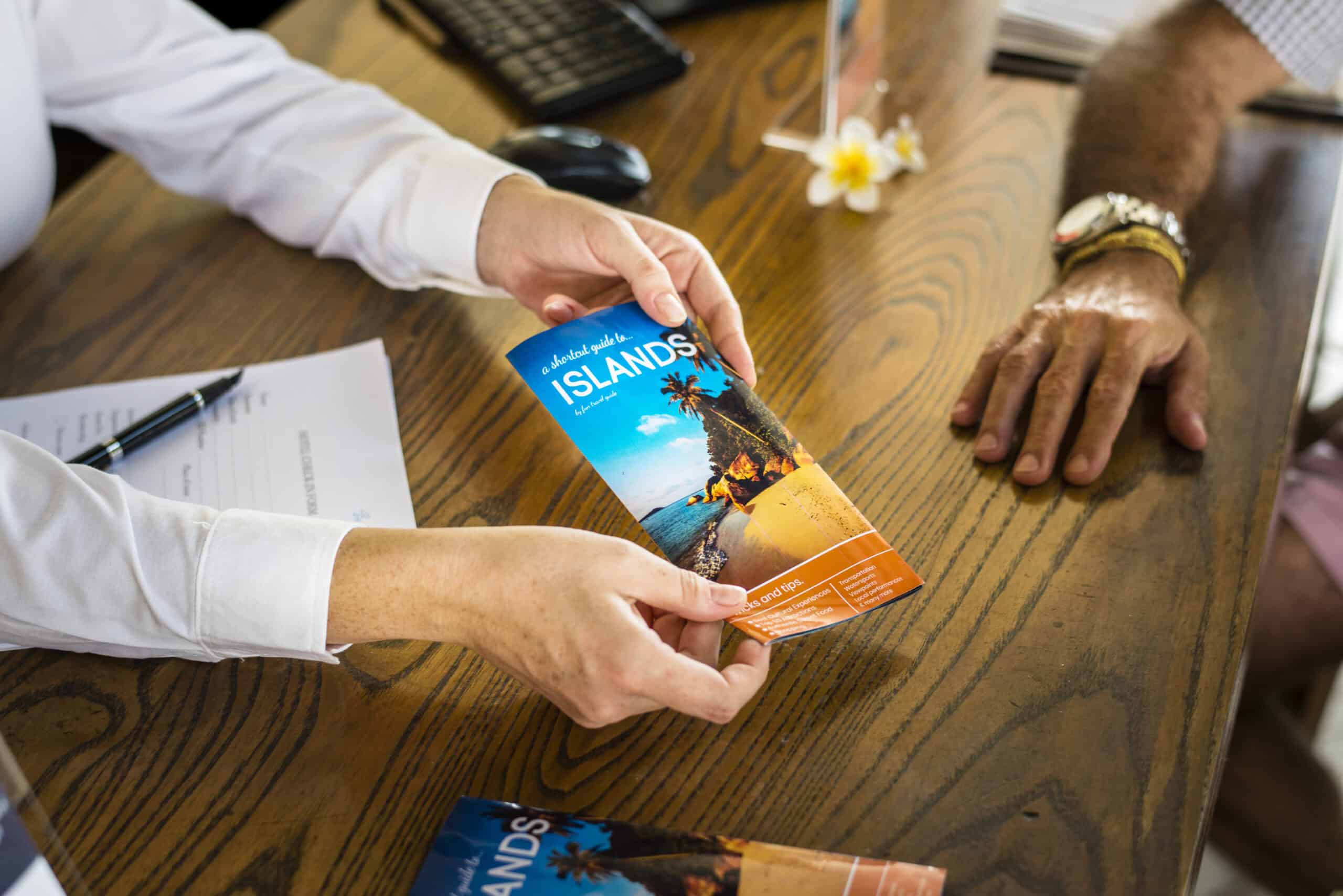 island vacation planning with colorful brochure an 2026 09 25 08 08 07 utc