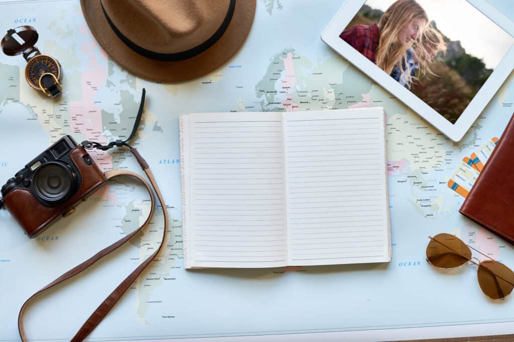 planning travel travel map with hat and camera 2026 09 24 07 37 53 utc